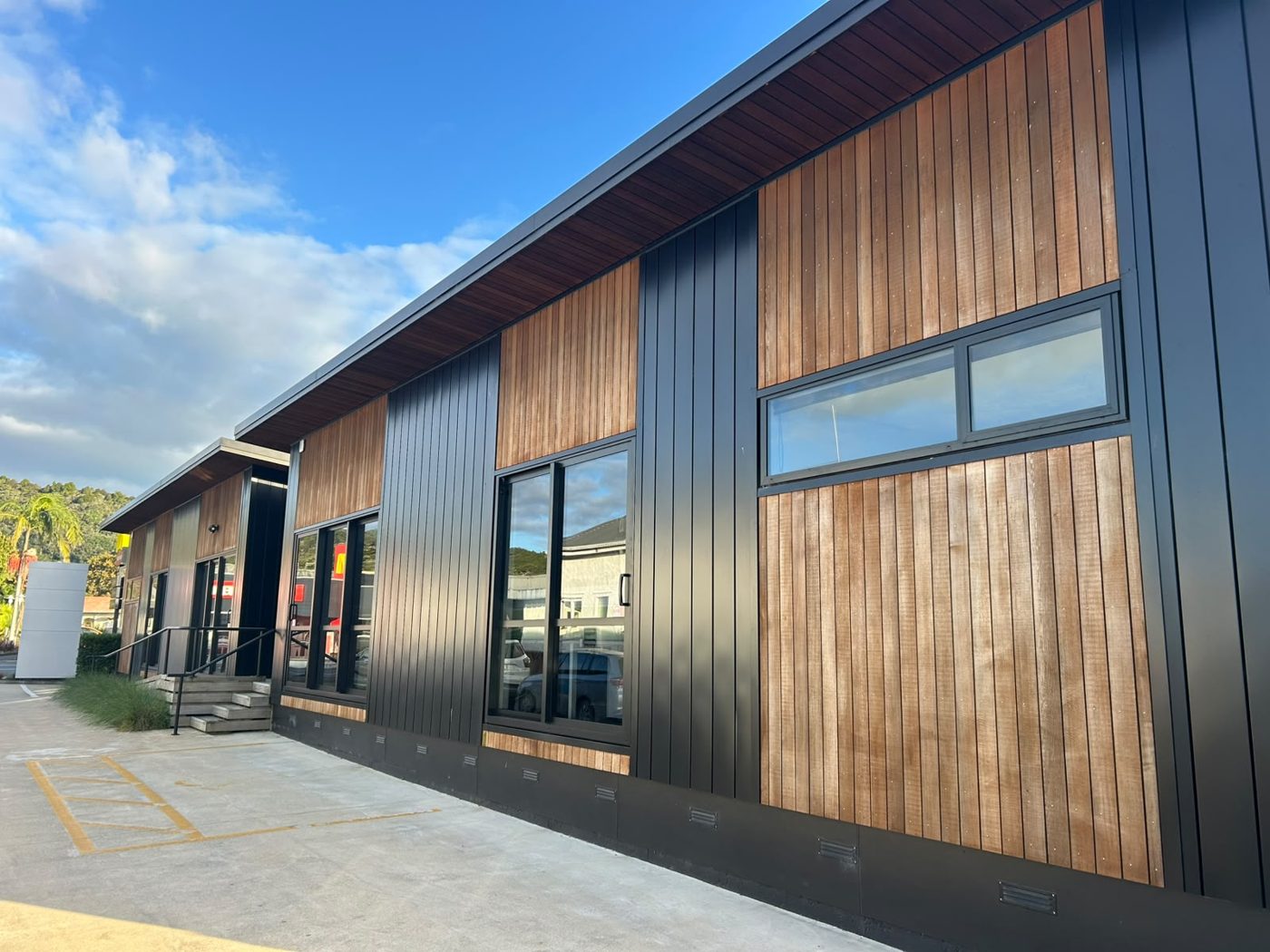 Timber and dark cladding exterior repaint